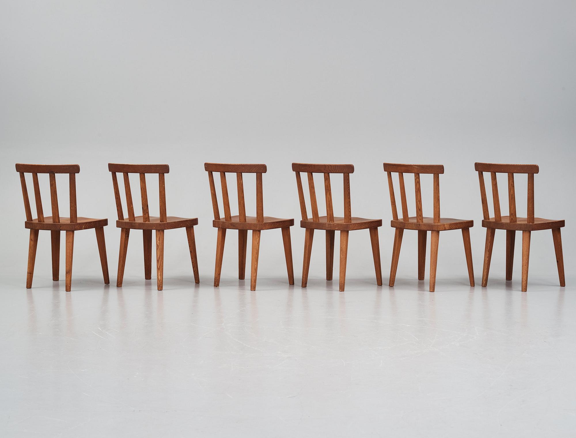 Axel Einar Hjorth, a set of six stained pine 'Utö' chairs, Nordiska Kompaniet, Sweden 1930s.