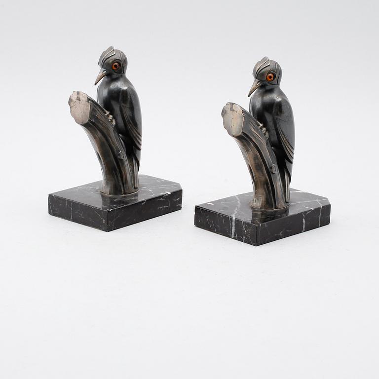 BOKSTÖD, 1 par, patinerad metall, signerade Franjuo, 1900-talets första hälft.