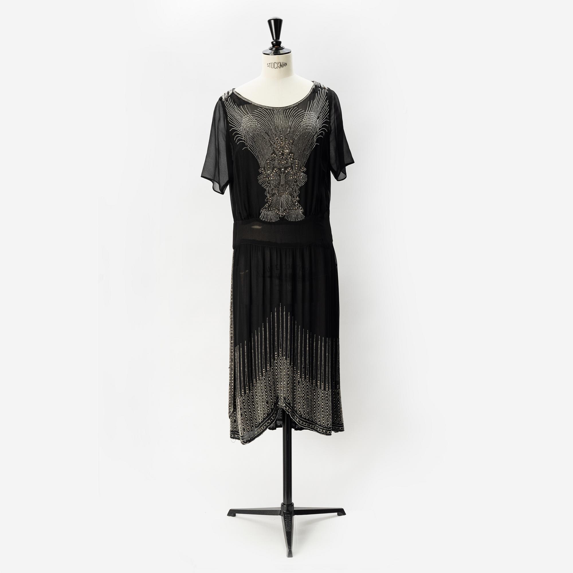 A 1920's pearl embroidered dress.