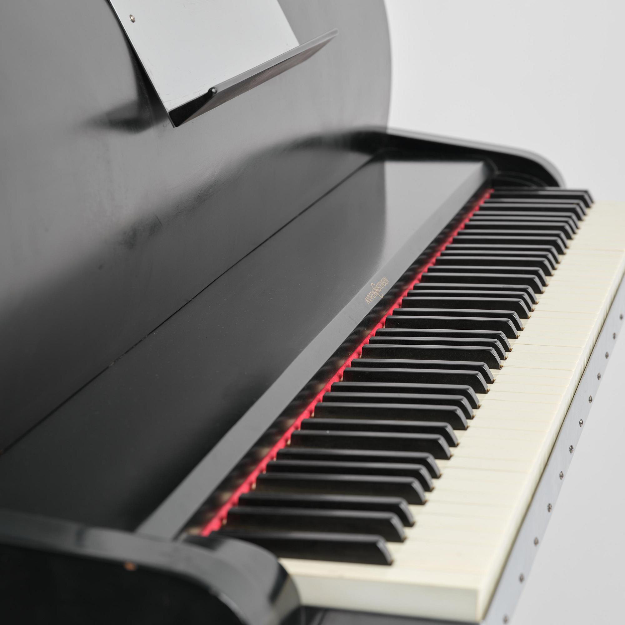 Poul Henningsen, a "PH Upright Piano", executed by Andreas Christensen, Denmark, 1940s.