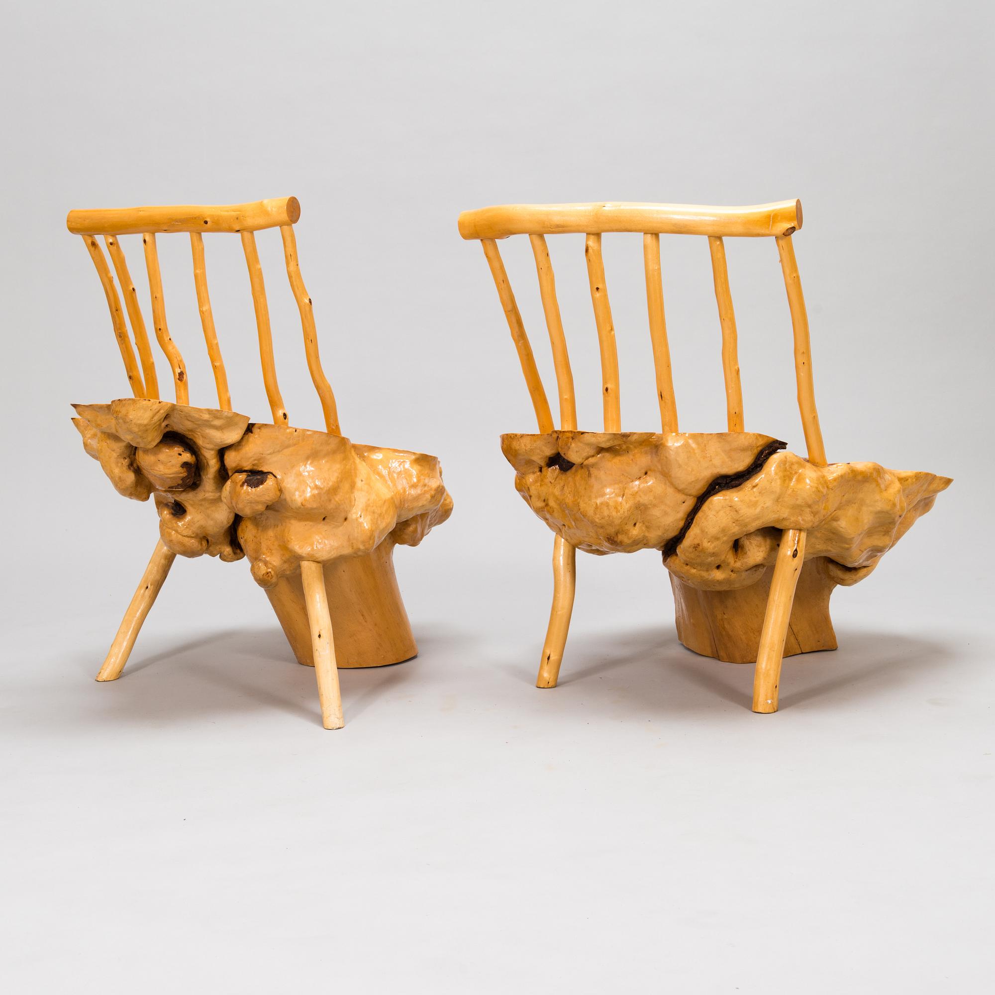 A pair of mid-20th century burr wood easy chairs made by  Johannes Järvelä, Finland.