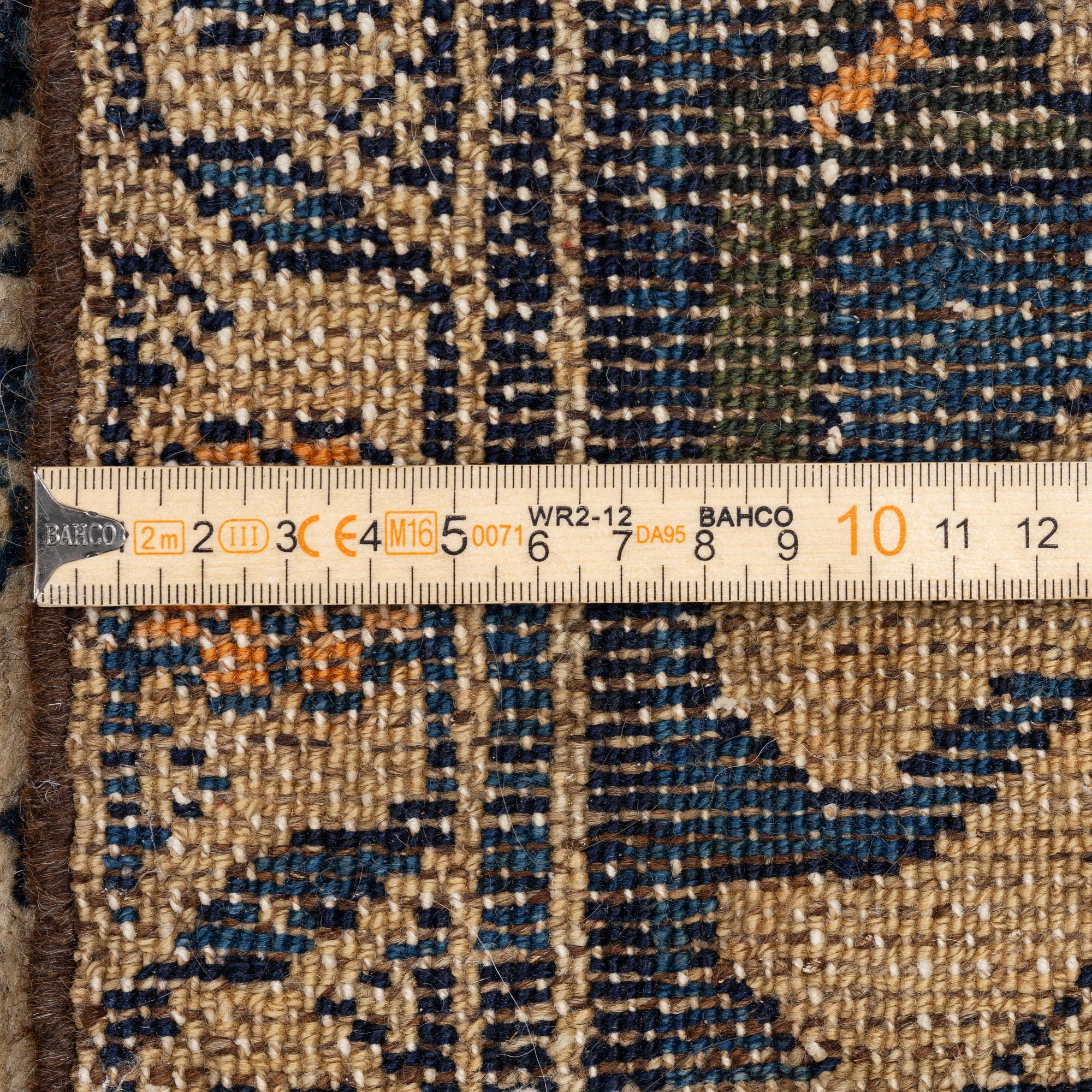 An antique Hamadan rug, c. 188 x 114 cm.