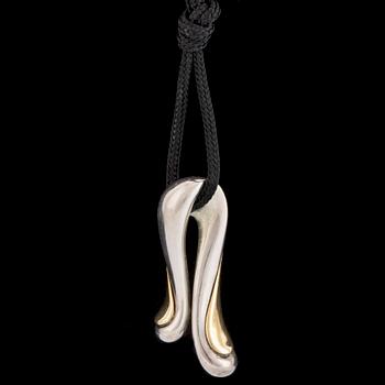 A silver and gold pendant by Minas Spiridis for Georg Jensen, designed in the 1990's.