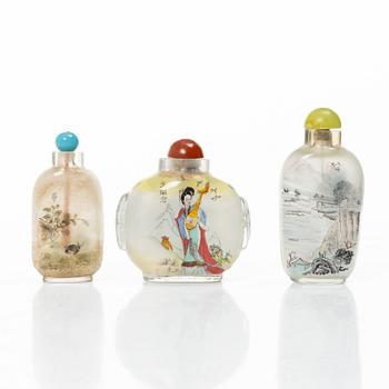 A group of three Chinese glass snuffbottles, 20th century.