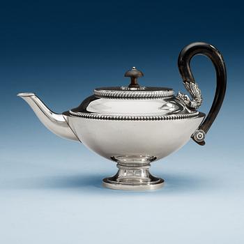 911. A Swedish 19th century silver tea-pot, makers mark of Adolf Zethelius, Stockholm 1818.