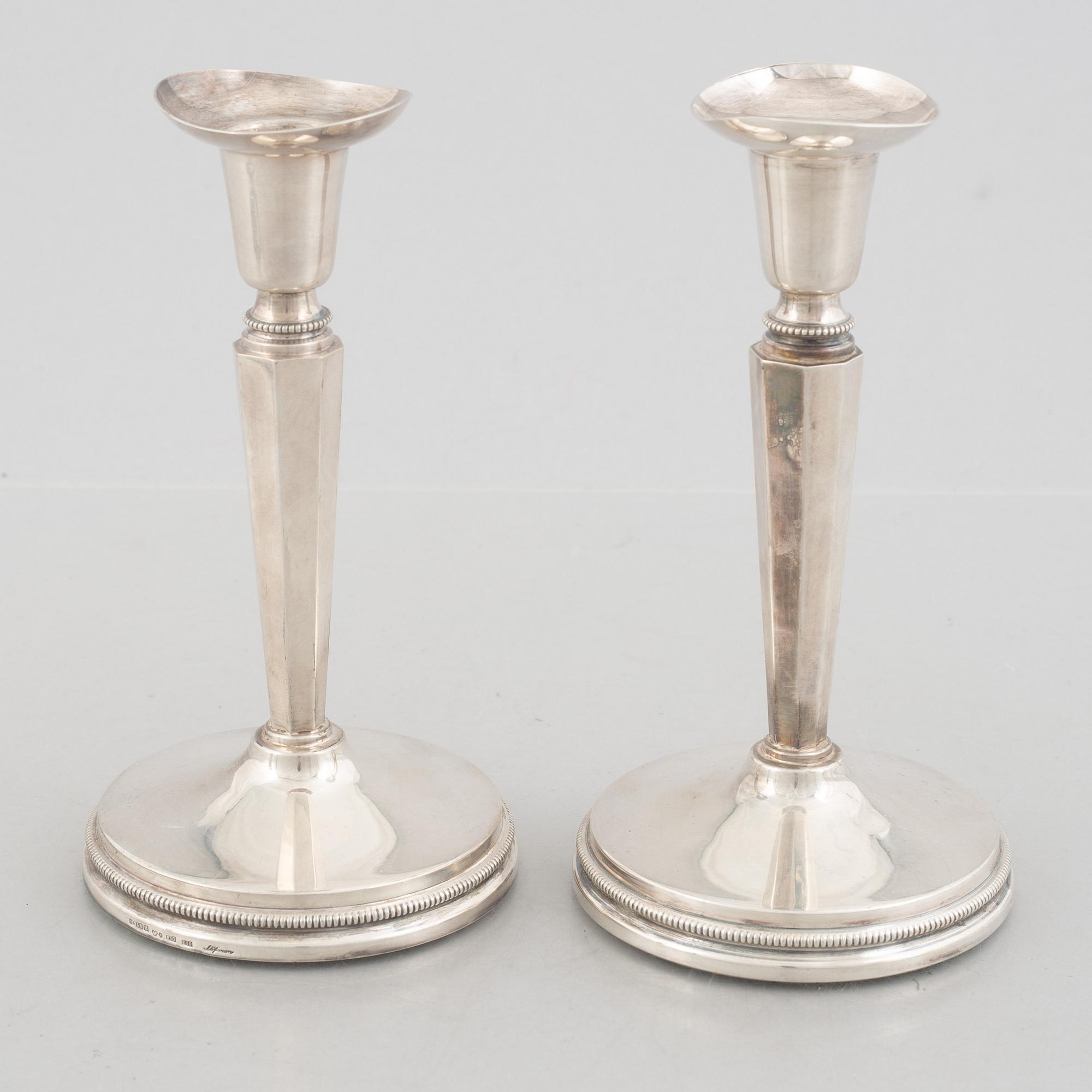 Two pairs of Swedish silver candlesticks, including Eric Löfman, MGAB, Uppsala 1979-1982.