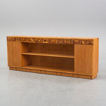 An inlaid bookcase from Mjölby Intarsia, 1930's.