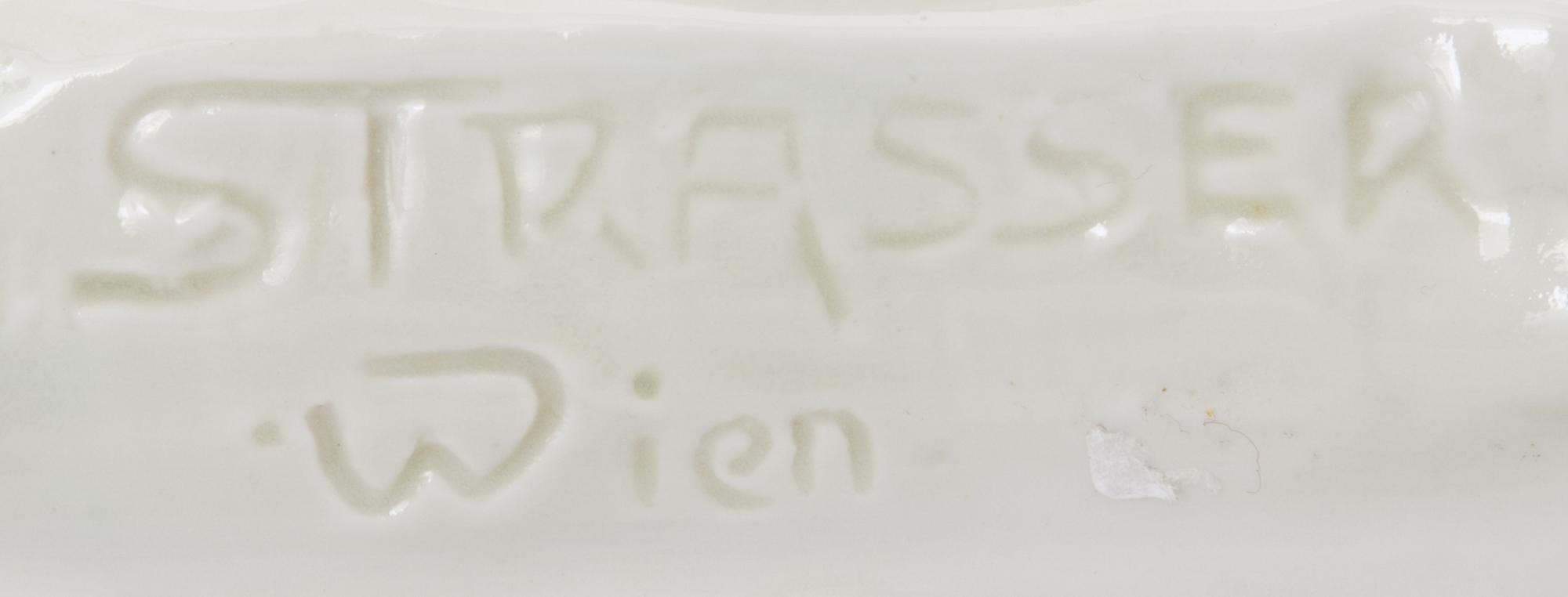 An Amphora porcelain figurine 2882, impressed mark Strasser Wien.