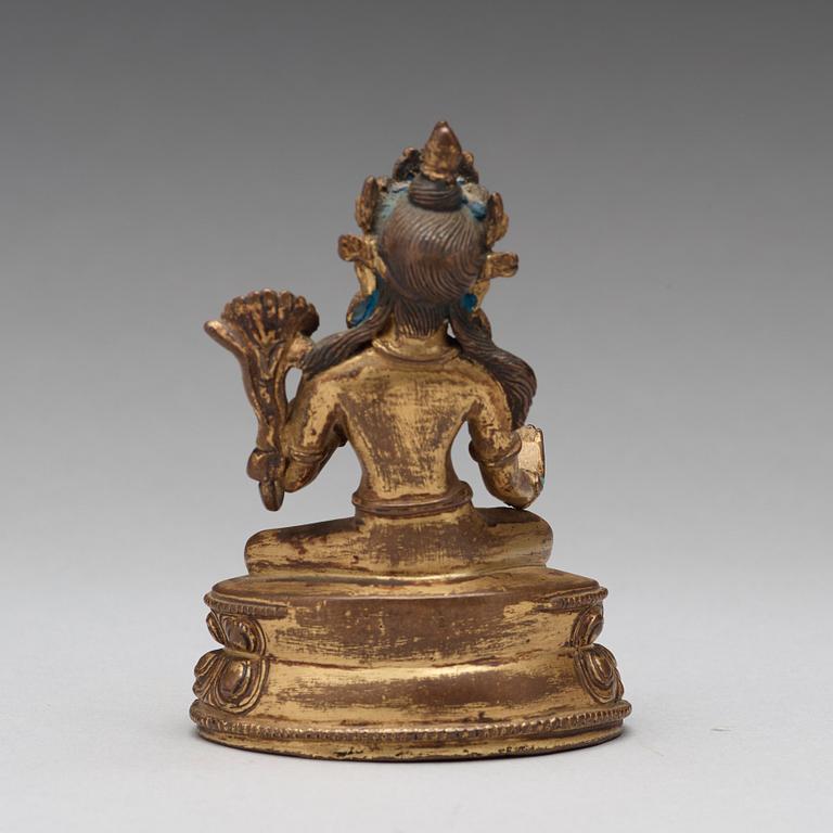 A Tibetan gilt copper alloy figure of Tara, 18th Century or older.