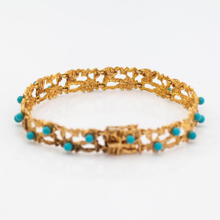 A 14K gold braclelet with turquoise imitation. H.Lahtinen&Co, Helsinki 1970.