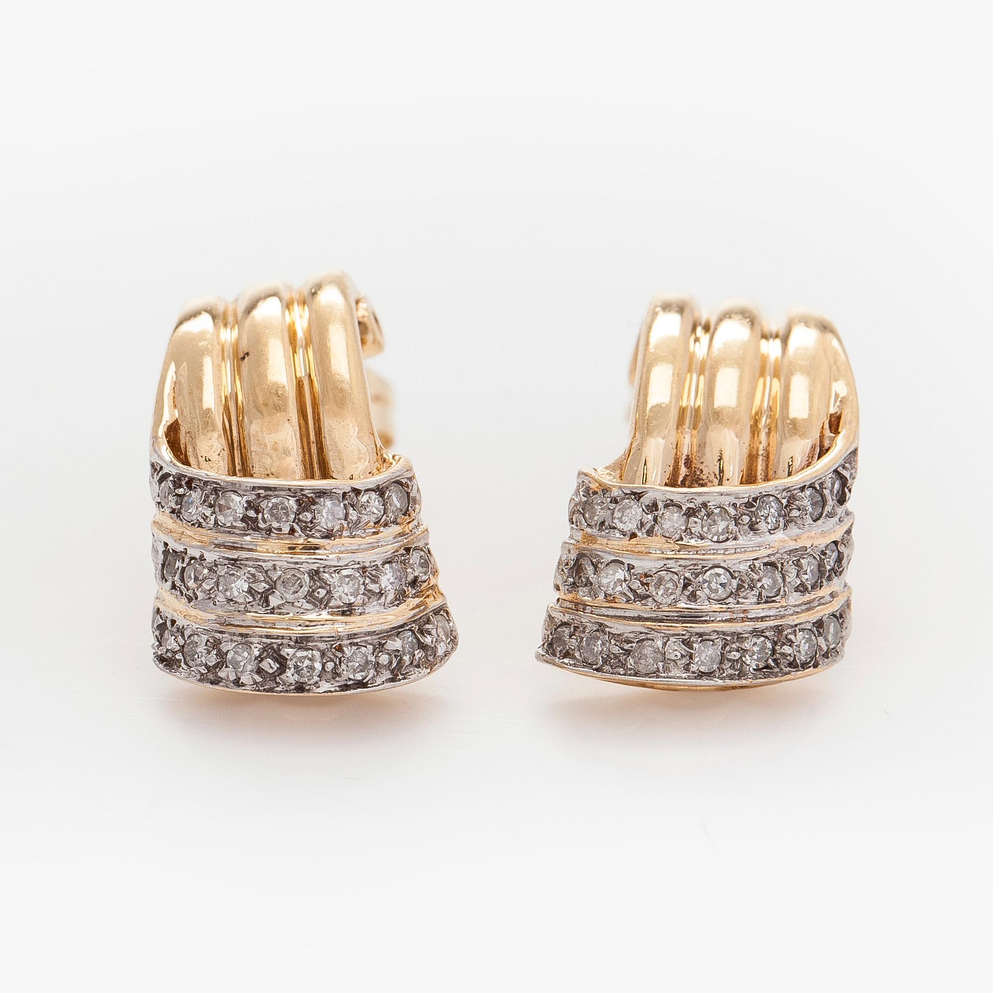 Korvakorut, 14K kultaa ja timantteja.