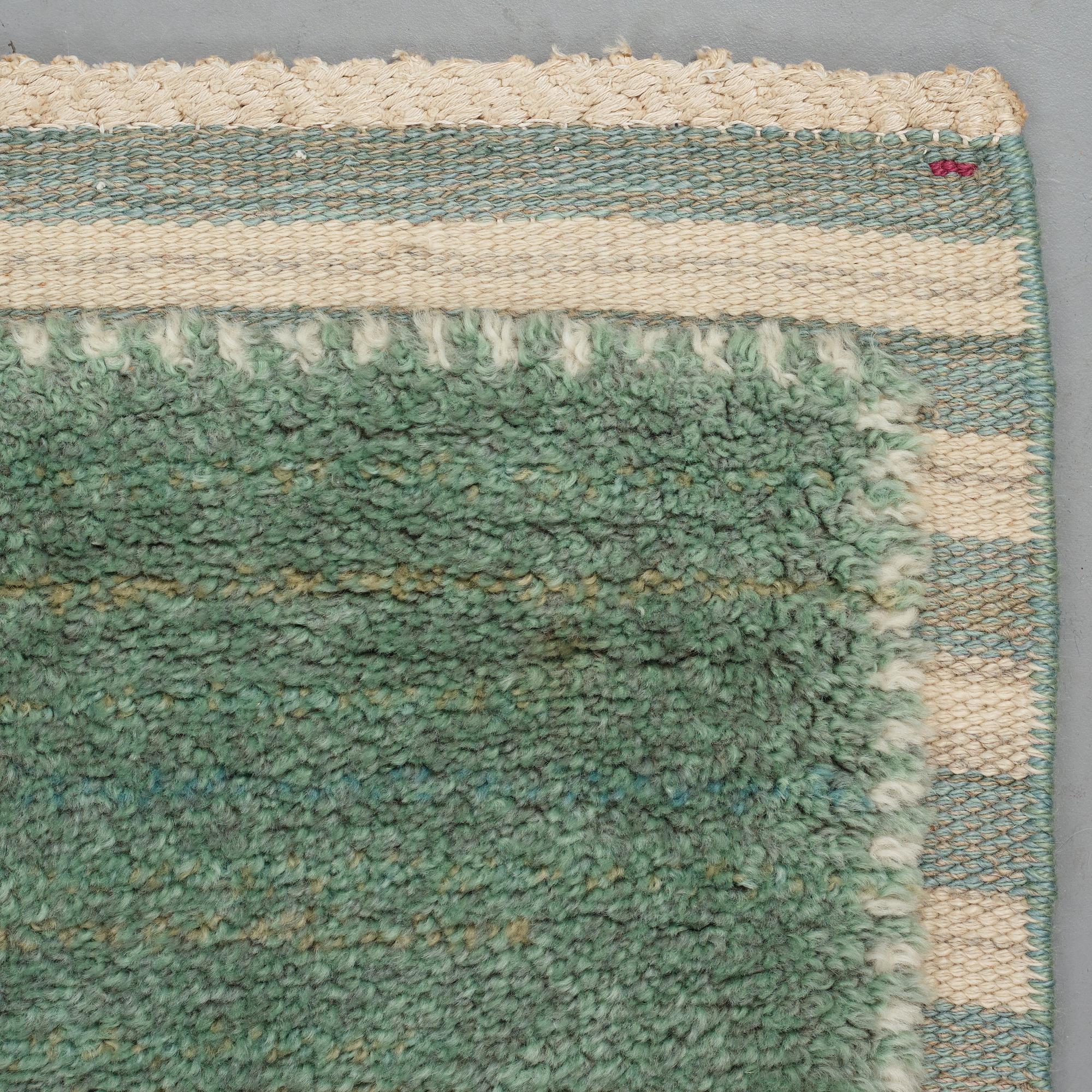 Barbro Nilsson, A carpet, "Gyllenrutan grön", knotted pile in relief ca 240,5-241,5 x 135,5-138 cm, signed AB MMF BN.