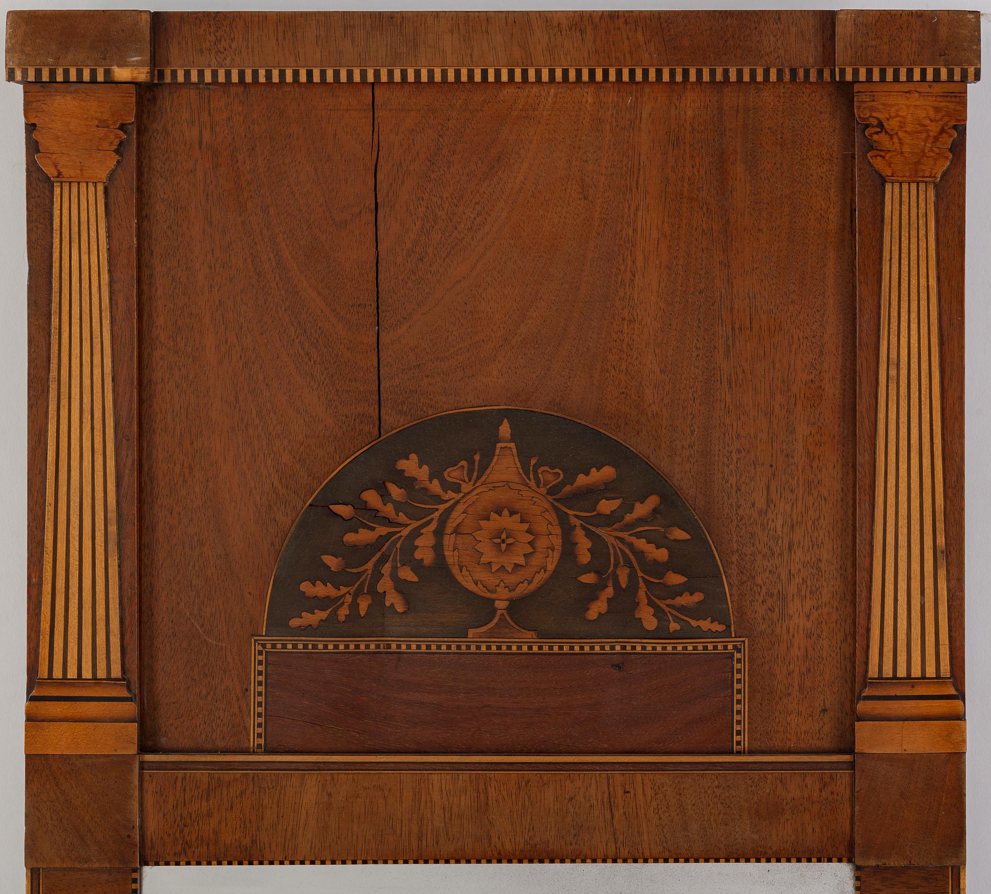 A first half of the 20th Century mahogany veneered mirror.