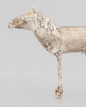 A collection of silver art by Lars Arby