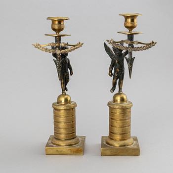 A pair of Empire candlesticks, first half of the 19th-century.