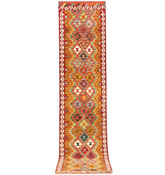 A Kilim runner, c. 390 x 80 cm.