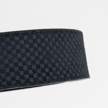 Louis Vuitton, a navy suede 'LV Initiales' belt. size 100, 2012.