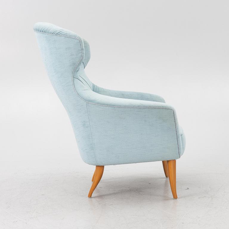 Kerstin Hörlin-Holmquist, an 'Onkel Adam' armchair, Triva series, Nordiska Kompaniet's workshops in Nyköping.