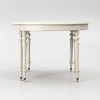 A 19th century dining table.