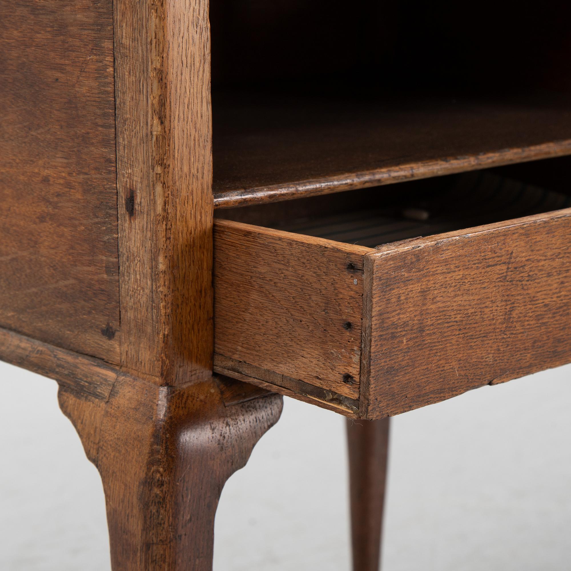 A rococo style bedside table, early 20th Century.