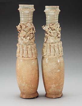 A set of two green glazed vases with covers, Yuan dynasty (1271-1368).