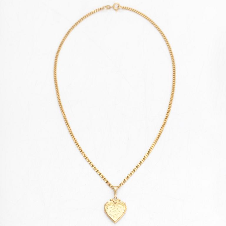 A heart pendant/medallion, 18K gold with a 14K gold chain.