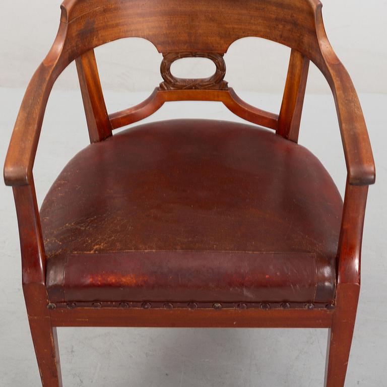 An Empire style writing desk, first half of/mid 20th century, and an Empire style chair, early 20th century.