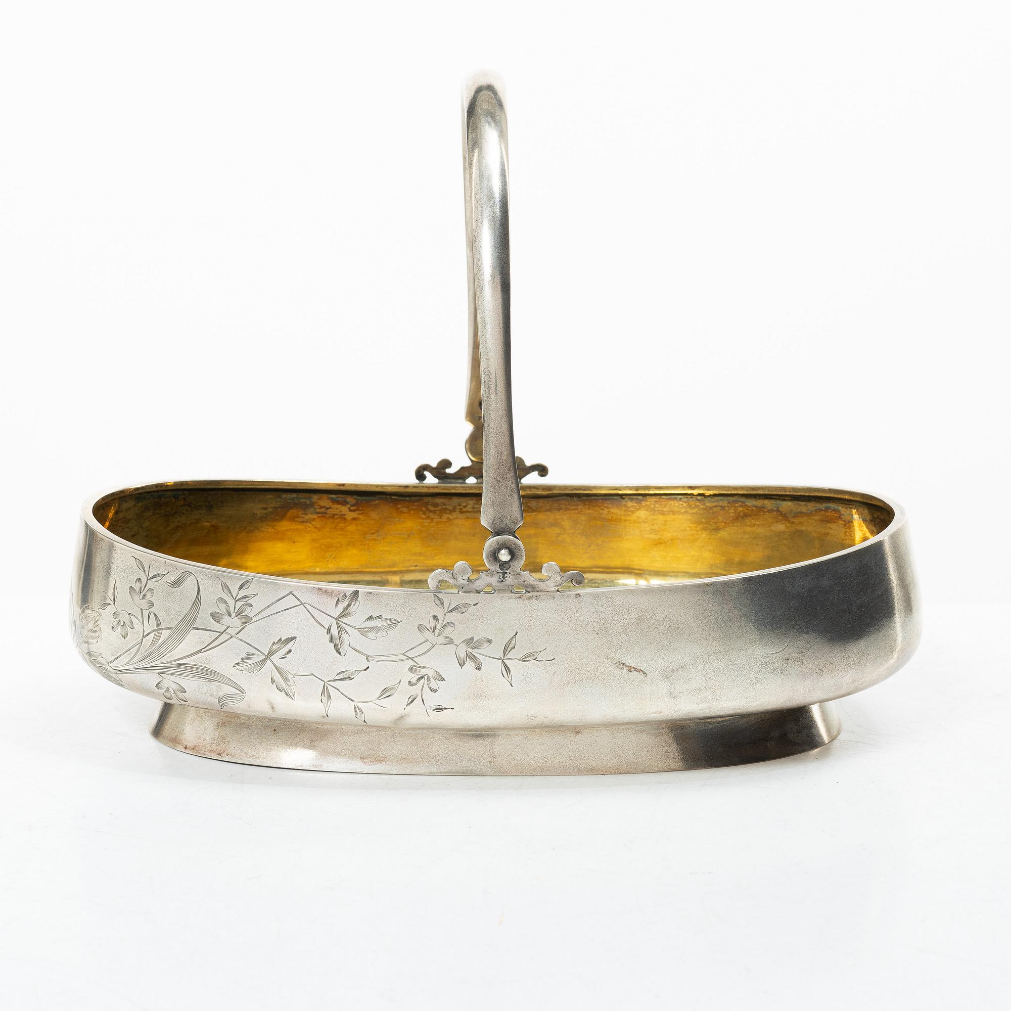 A Russian parcel gilt silver bread basket, mark of Victor Fink, Moscow, active 1897–1917.