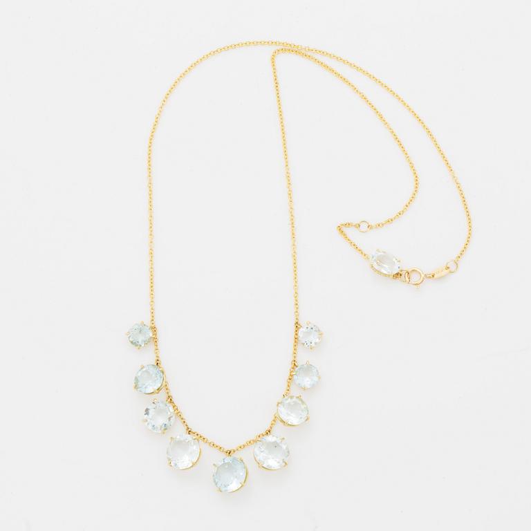 Collier, med runda fasettslipade akvamariner.