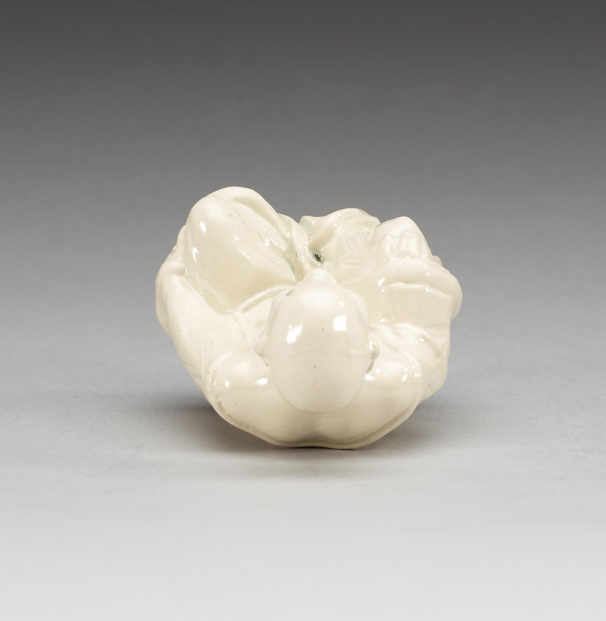 A cream ware 'Pagoda' figure, 19th Century.