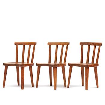 402. Axel Einar Hjorth, a set of three stained pine "Utö" chairs, Nordiska Kompaniet, Sweden, 1930s.