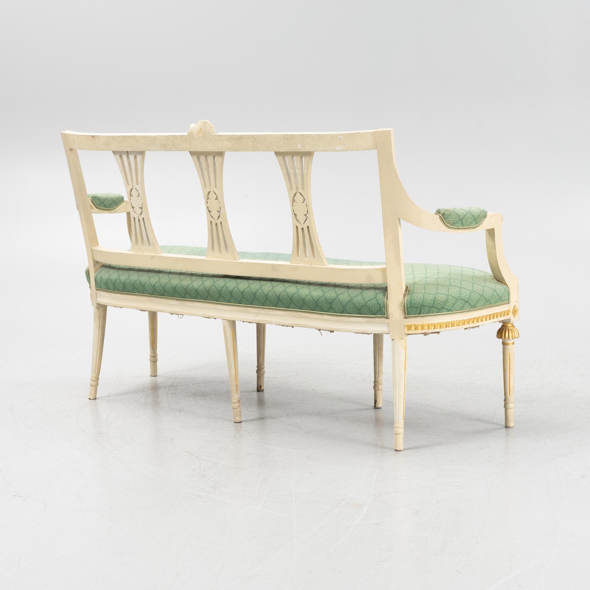 A painted and carved Gustavian style sofa, 1920's.
