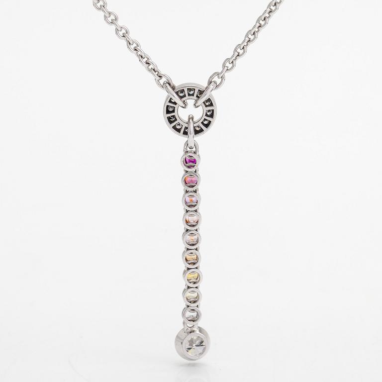 An 18K whitegold necklace with a diamond ca 1.01 ct, smaller diamonds tot. ca 0.15 ct, ruby and 
sapphires, Helsinki.