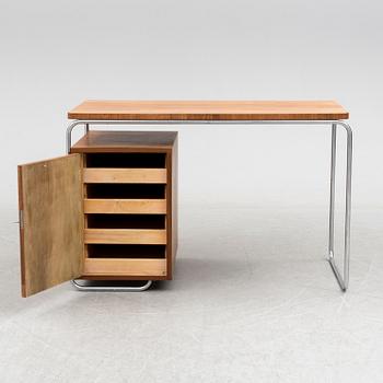 A walnut and tubular steel table, 1930's.