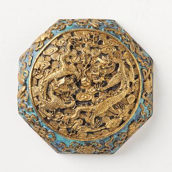 A bronze imitating seal paste box with cover, Qing dynasty, with Qianlong mark.
