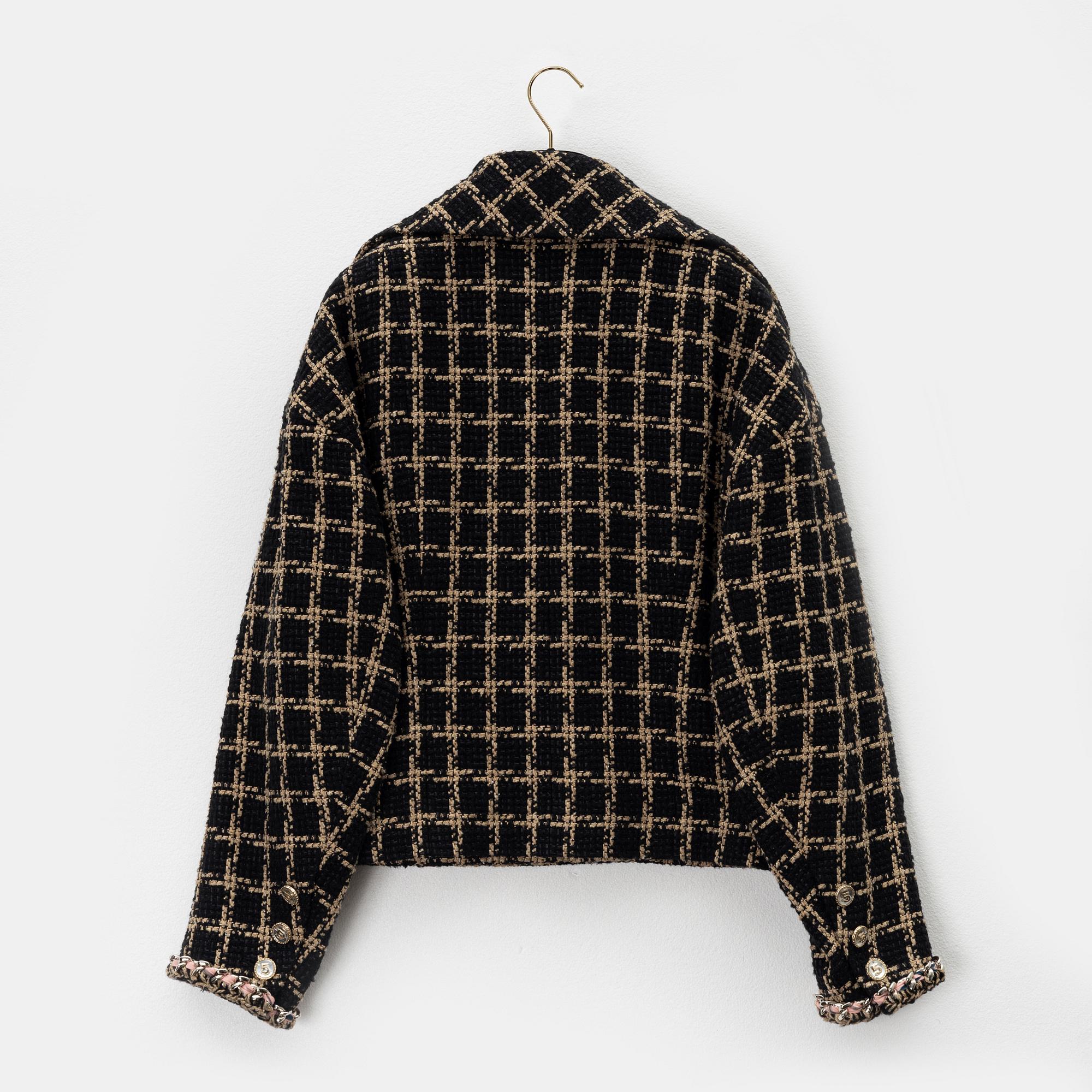 Chanel, a bouclé jacket size 34.