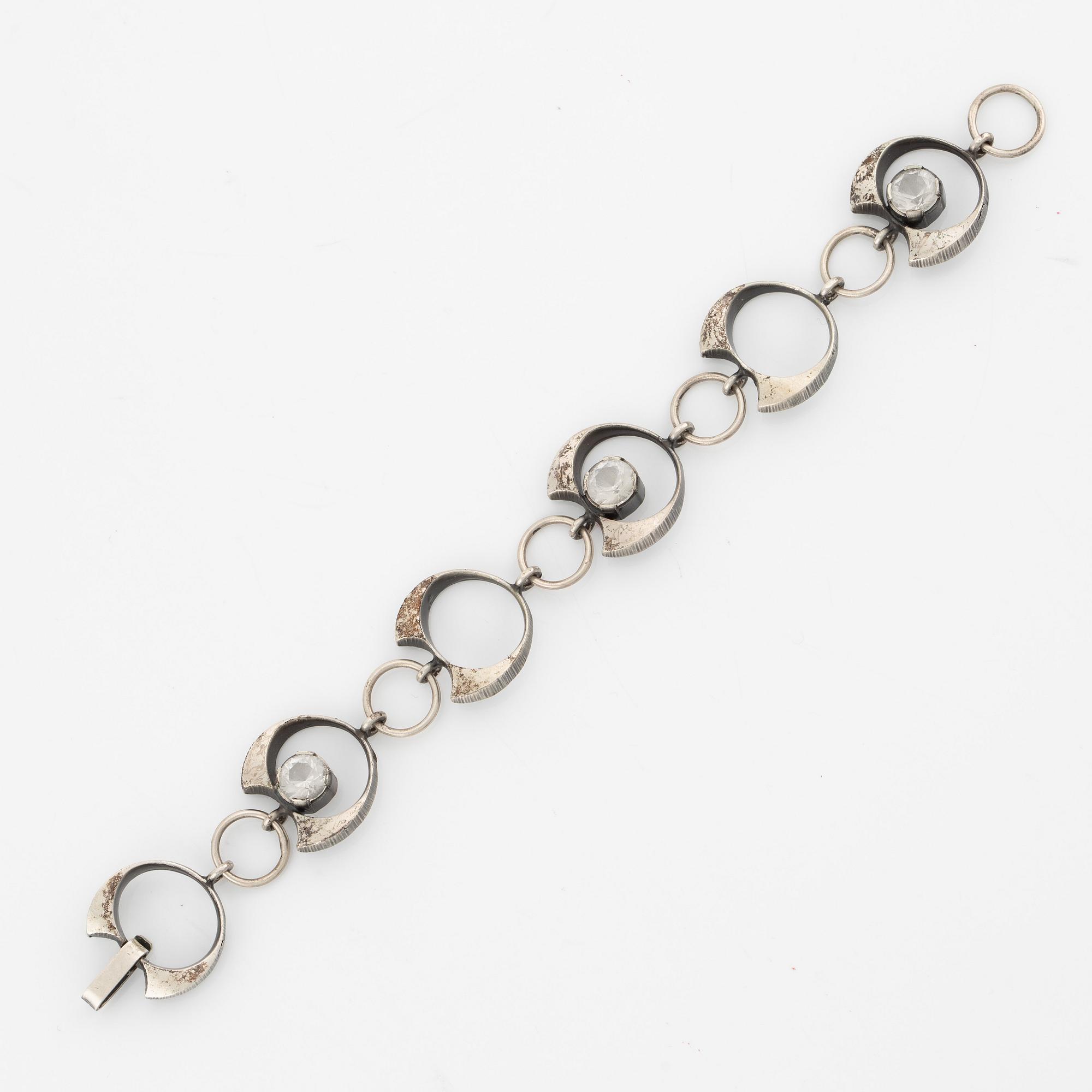 Karl Laine, ring, pendant, and bracelet, silver with rock crystal.