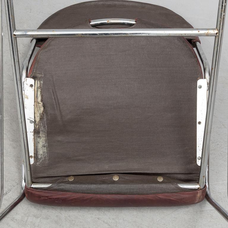 A set of four chairs by Sam Larsson, Dux, late 20th century.