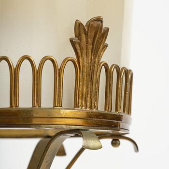 Swedish Grace, a brass and glass lamp, 1920s-40s.