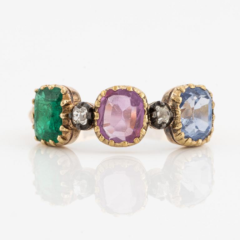 Ring in 18K gold with likely synthetic ruby, sapphire, emerald, and old-cut diamonds.
