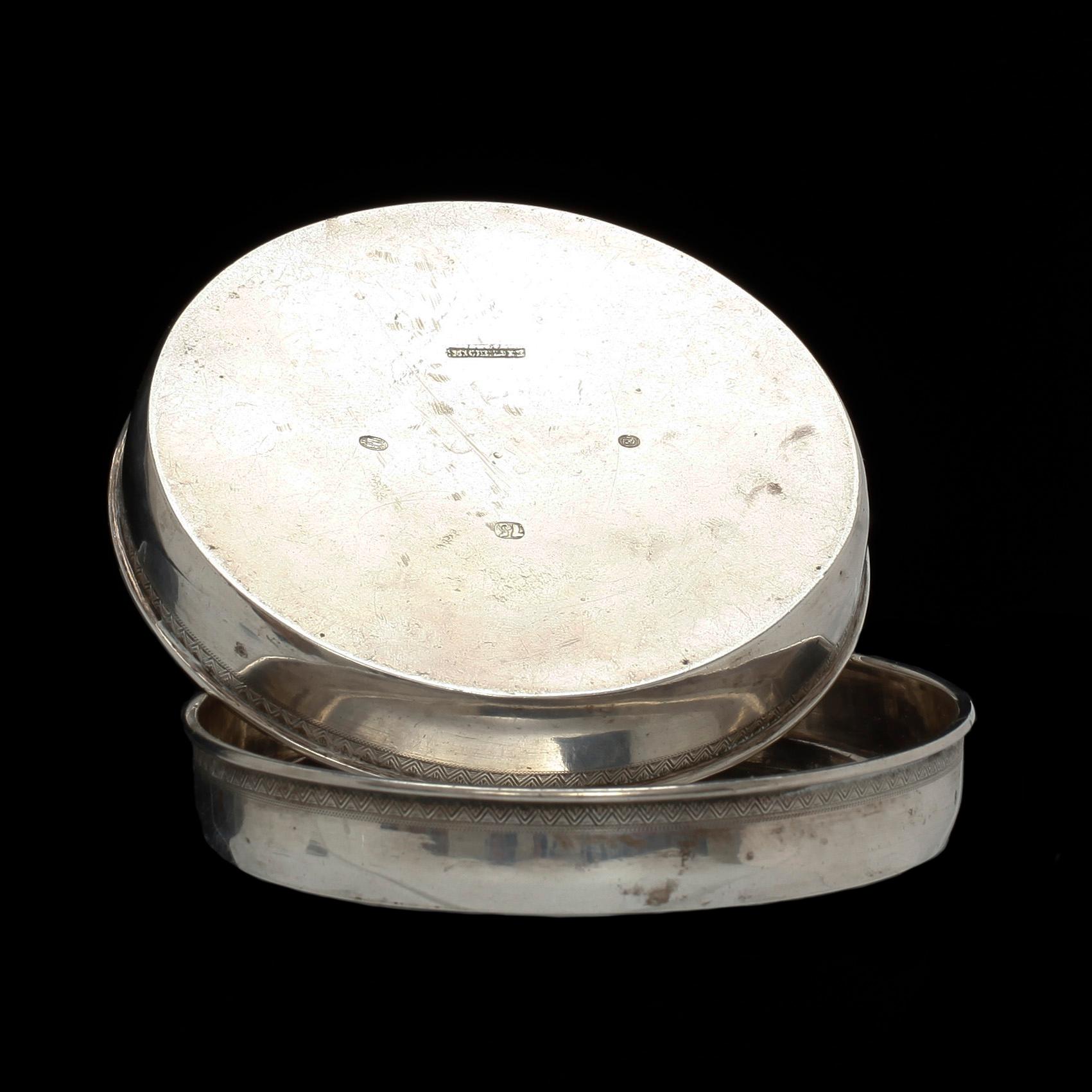 COASTERS, silver, ett par. Anton Michelsen, Köpenhamn 1875. Vikt 158 gr.