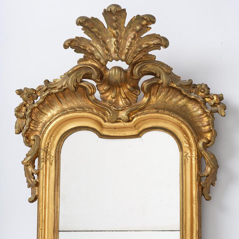 A Swedish rococo giltwood four-branch girandole mirror, Stockholm, later part 18th century.