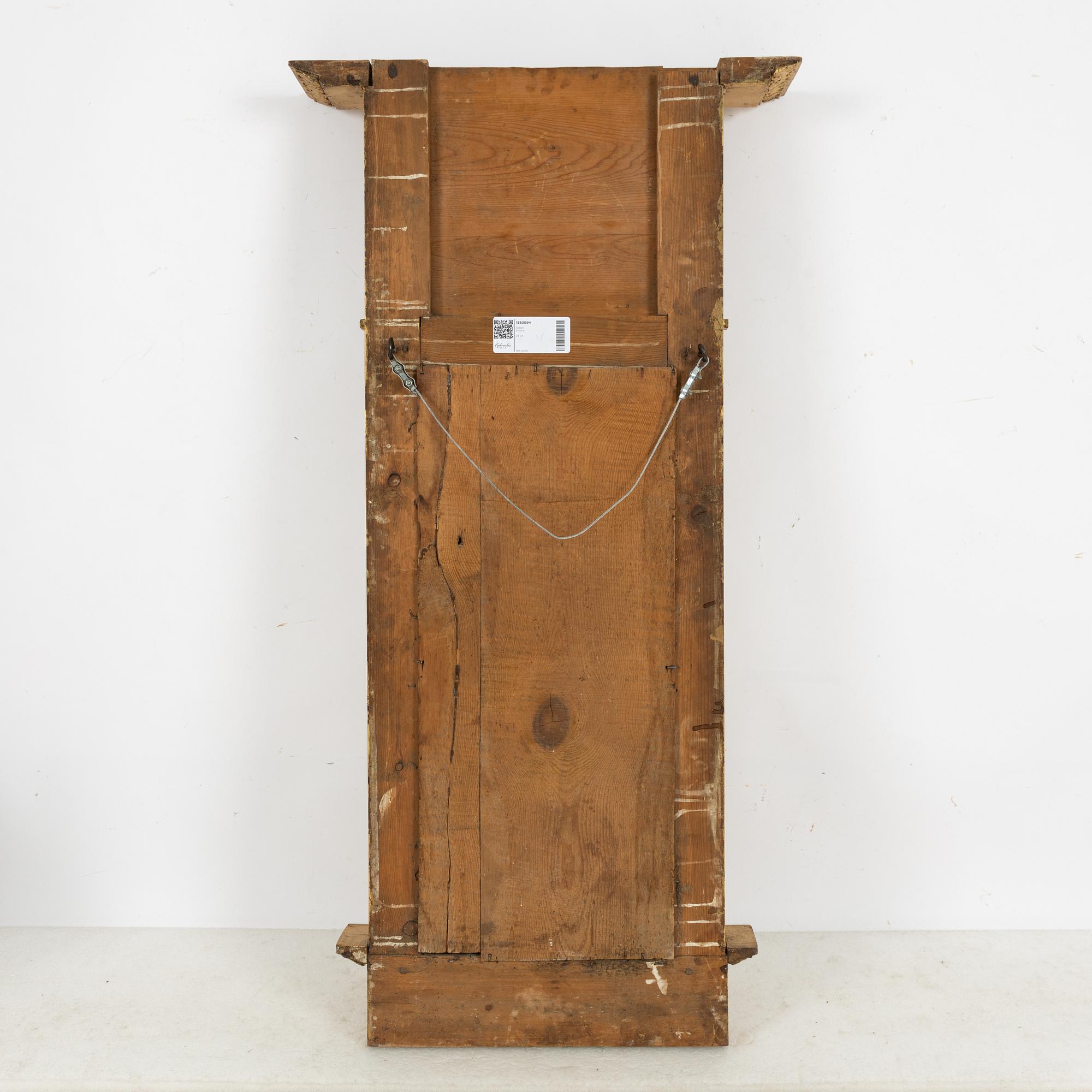 An Empire mirror, 1820.