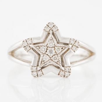 Ring, 18K white gold in the form of a star set with brilliant-cut diamonds.