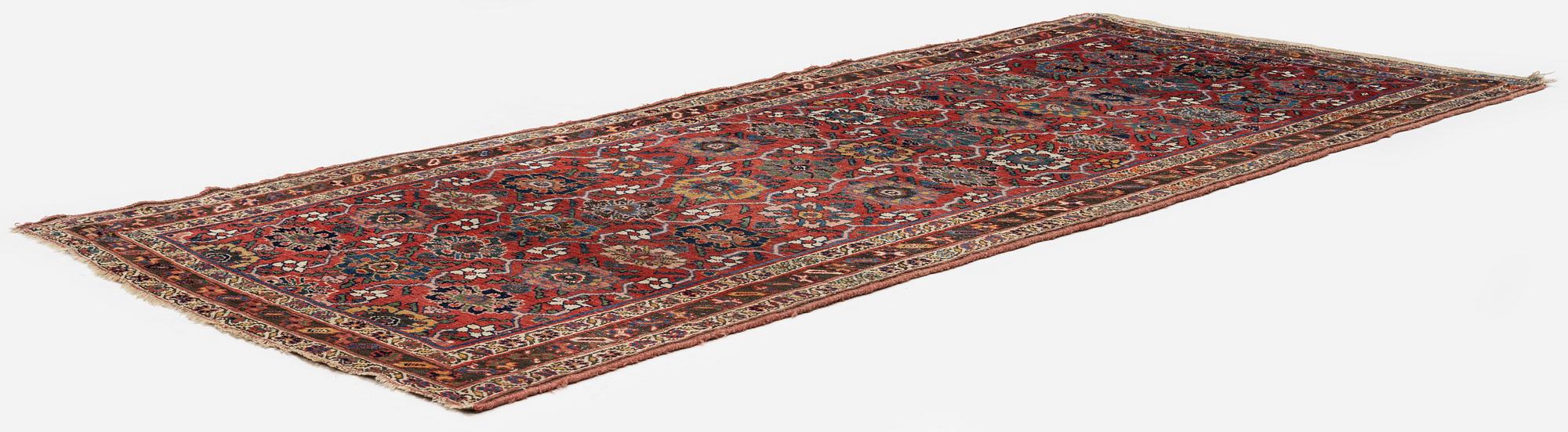 An antique Bidjar carpet, West Persia, c. 352 x 148 cm.