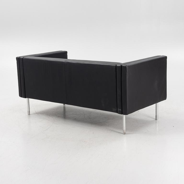 A leather upholstered sofa, 21st Century.