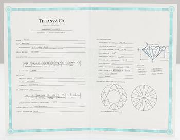 Tiffany & Co, A platinum ring with a ca. 0.55 ct diamond.