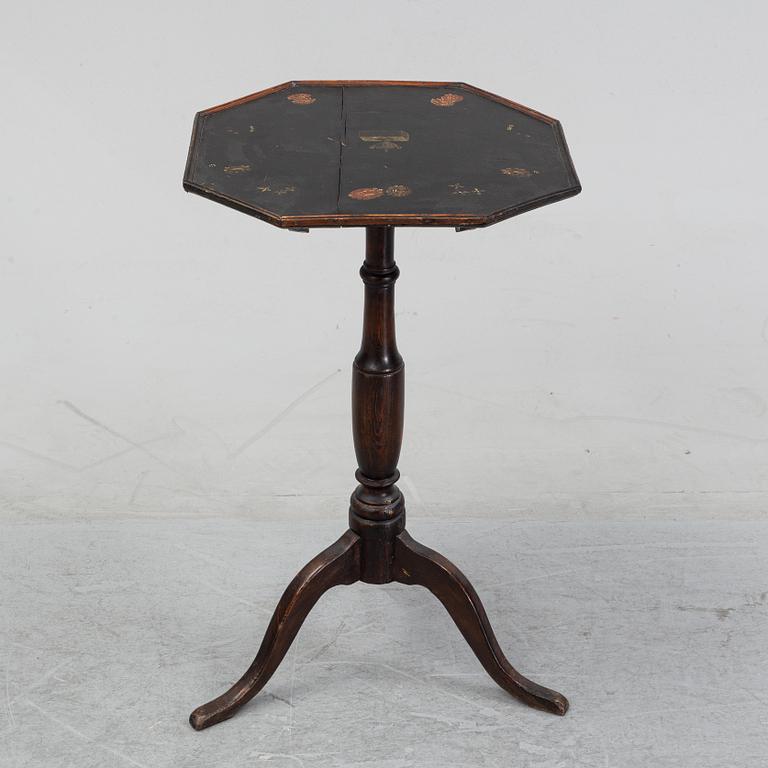 A painted folding table, 19th Century.