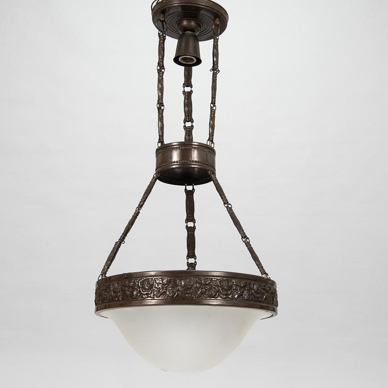 An early 20th century Jugend style ceiling lamp.