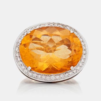 1097. A citrine, brilliant-cut diamond and laquer ring. The laquer in leopard pattern. Total gem-weight diamonds circa 0.42ct.